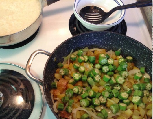 adding chopped okra to the stew