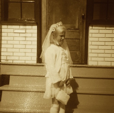 Little Blonde Girl's First Communion 